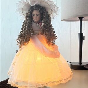 Elegant Illuminated Doll with Hat